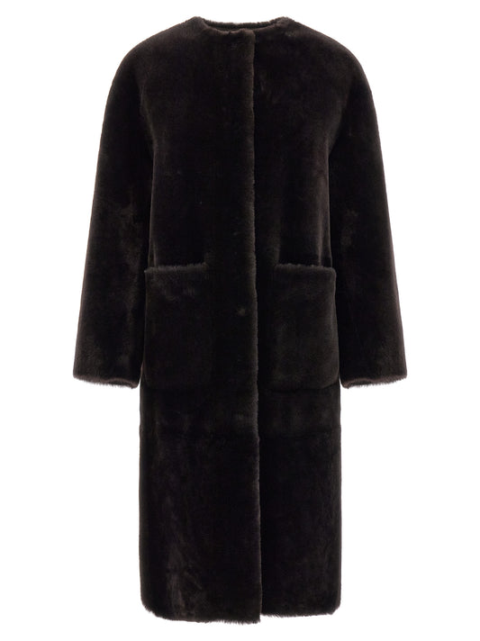 Overcoat by BLANCHA for women in lamb shearling brown features a contemporary silhouette showcasing a contemporary round neckline and refined pockets for a sophisticated finish.