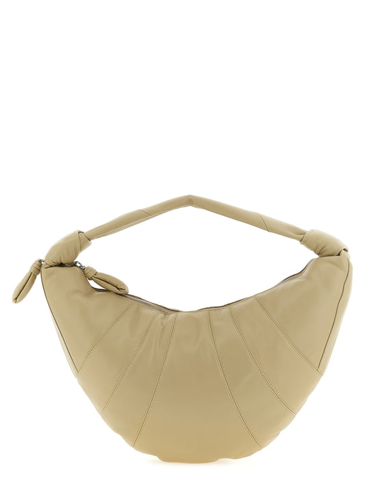 Shoulder Crescent Bag by Lemaire for women in cotton canvas & lambskin leather beige, sand & silver features a effortless sophistication silhouette, secured by a zipper with ample and versatile shoulder-strap & handle for a effortless sophistication finish.