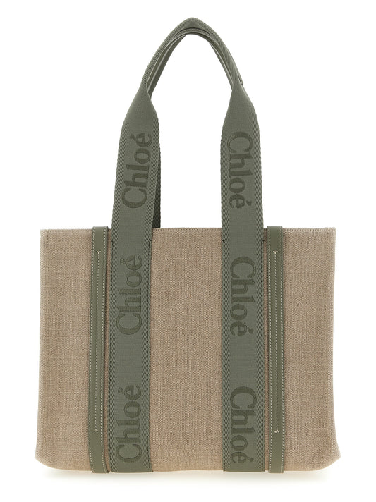 Medium Shopper Tote Bag by Chloé for women in linen canvas & leather bicolour & green features an sumptuous Woody Linen Canvas & Leather Medium Shopper Tote Bag design with a secure , ample , and versatile for an sumptuous finish.
