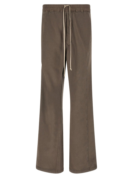Trousers by DRKSHDW for men in cotton gray features a artisanal silhouette, showcasing a sophisticated flared & wide with a long and for a artisanal finish.