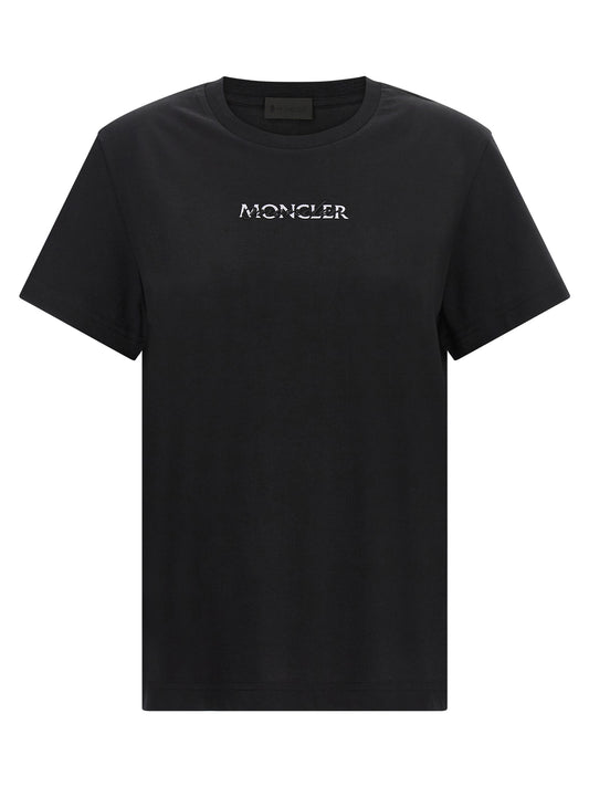 T-Shirt by Moncler for women in cotton black showcases a dramatic silhouette, elegantly detailed with a dramatic and short-sleeve for a truly dramatic finish.