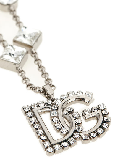 Necklace by Dolce & Gabbana for women in polyester viscose & rhinestone and silver, transparent, signature & monogram showcases a radiant silhouette, artfully capturing the elegance of Women's Silver Brass & Glass Necklace through its intricate chain pendant statement necklace design.