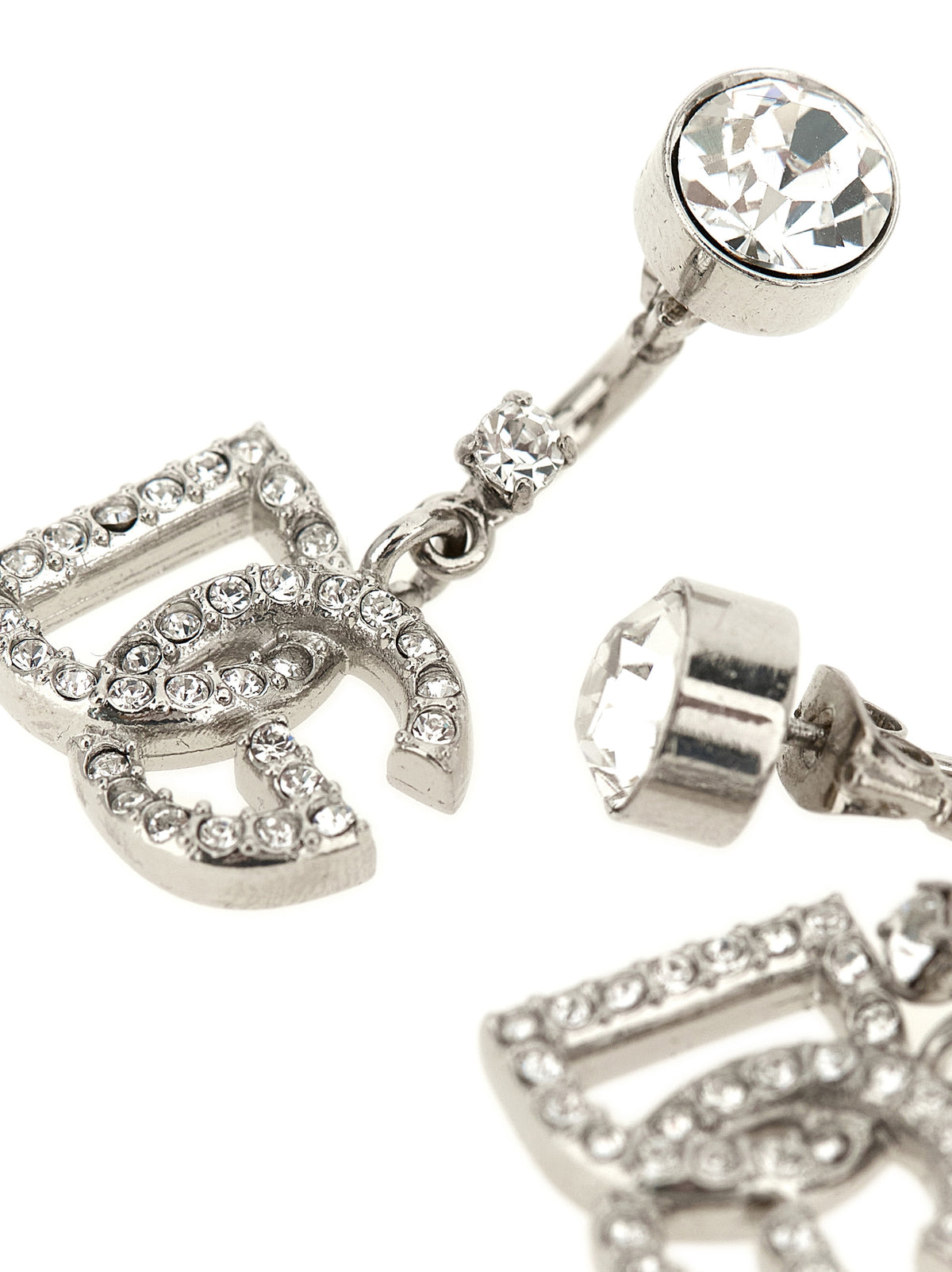 Earrings by Dolce & Gabbana for women in polyester viscose & rhinestone silver, transparent & monogram presents a exquisite silhouette, showcasing a exquisite from the Women's Silver Brass & Crystal Earrings collection for a truly exquisite finish.