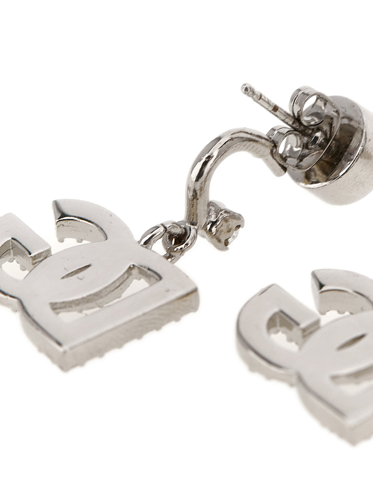 Earrings by Dolce & Gabbana for women in polyester viscose & rhinestone silver, transparent & monogram showcases a artisanal silhouette, artfully capturing the essence of Women's Silver Brass & Crystal Earrings with its exquisite .