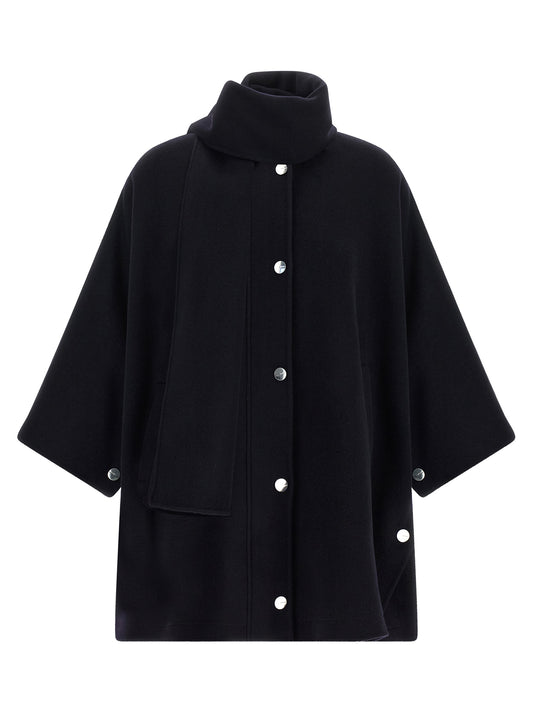 This Cape by PINKO for women in polyamide & wool blue & silver presents a voluminous silhouette, showcasing refined and a sophisticated turtle neckline for a voluminous finish.
