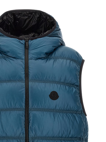 Hooded Vest by Moncler for men in polyamide blue & teal features a enviable silhouette, elegantly detailed with a enviable hooded neckline and functional pockets, hooded & insulated for a enviable finish.