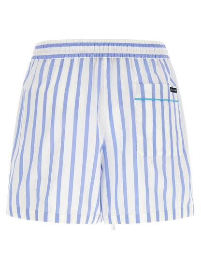 Bermuda Shorts by Dolce & Gabbana for women in cotton & silk light-blue, white, signature & striped features a sartorial silhouette, showcasing a sartorial relaxed-fit and short with a sophisticated for a sartorial look.