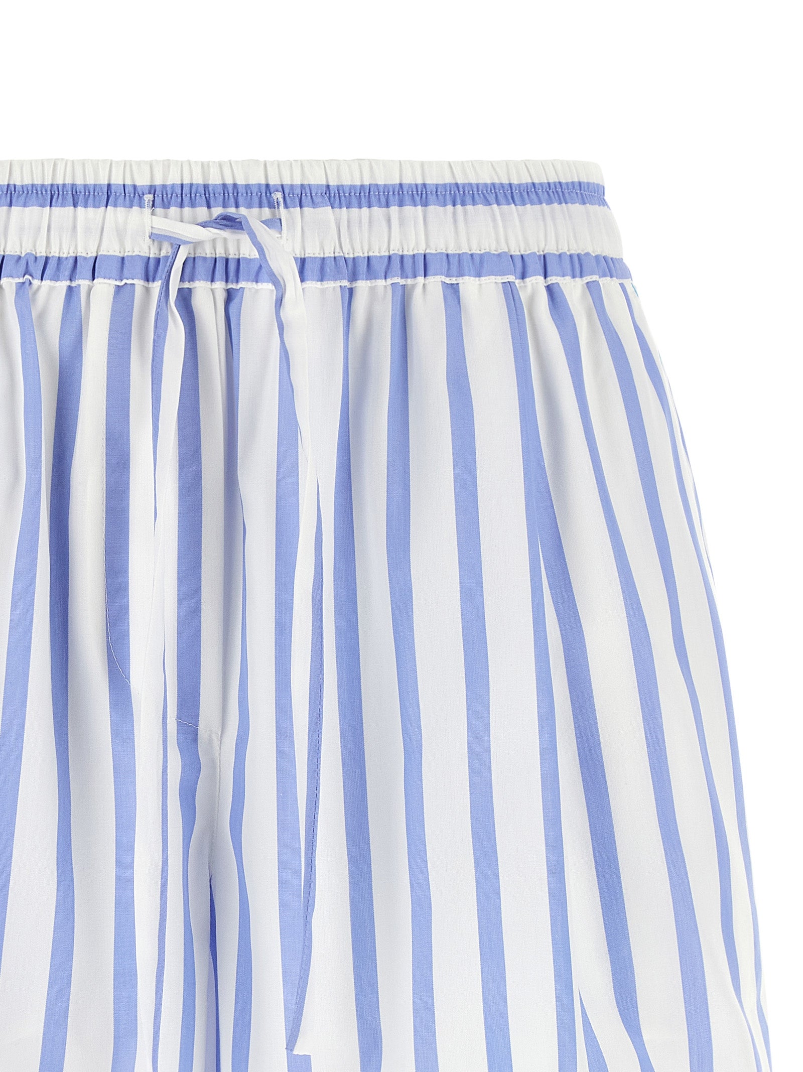 Bermuda Shorts by Dolce & Gabbana for women in cotton & silk light-blue, white, signature & striped presents a sleek silhouette, featuring a sleek relaxed-fit with a refined short and a sophisticated .