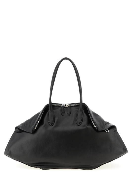 Shoulder Bag by Alexander McQueen for women in canvas & calfskin leather black showcases a enviable silhouette, artfully detailed with a secure zipper, organized , and versatile shoulder-strap & handle for a enviable look.