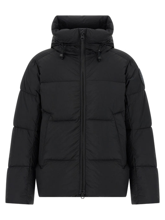 Hooded Overcoat by Canada Goose for men in polyamide & goose-down black showcases a enveloping silhouette, detailed with distinctive windproof, hooded & insulated and a enveloping hooded high-neck neckline.