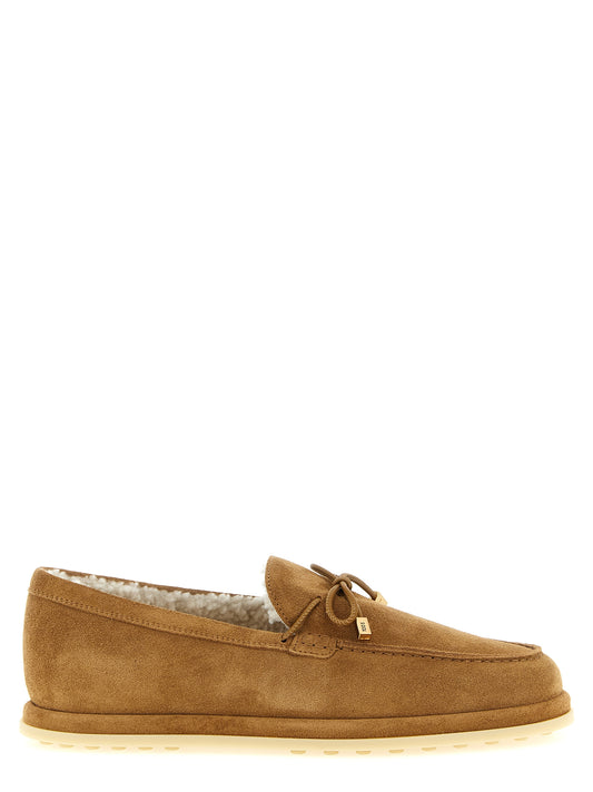 Flat Moccasin Moccasins Loafer Slip-On Shoes by Tod's for women in suede calfskin leather beige & signature features an effortless chic silhouette, showcasing the Women's Suede Calfskin Leather Flat Moccasin Moccasins Loafer Slip-On Shoes design with an effortless chic flat and a for a effortless chic look.