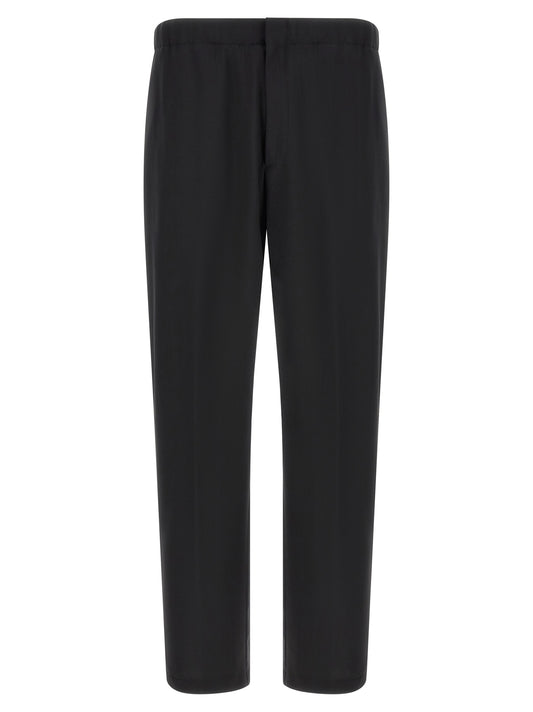 Trousers by Lardini for men in virgin wool black presents a perennial silhouette, meticulously tailored with a straight-leg cut, long finish, and an elegant .