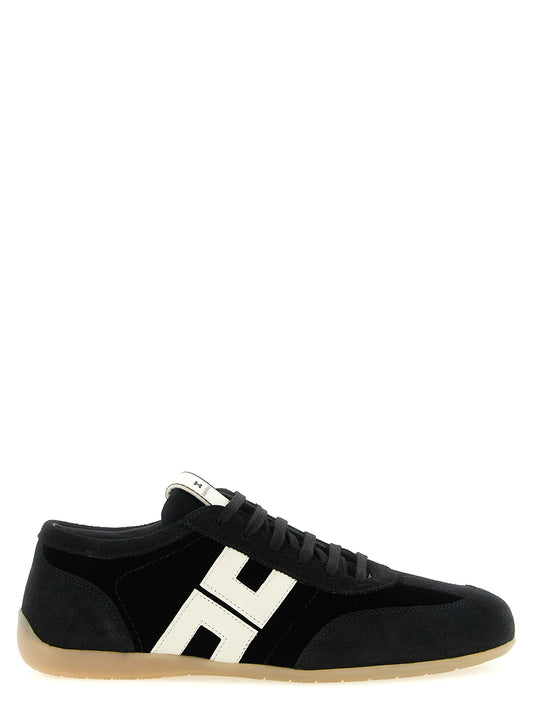 Sneakers by Elisabetta Franchi for women in plush velvet & nappa leather bicolour, black, honey & white presents a sumptuous silhouette, artfully capturing the essence of the Women's Low Top Plush Velvet & Nappa Leather Sneakers with its sumptuous low-top style design.