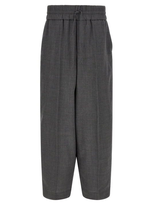 Trousers by Ami Paris for men in virgin wool gray & signature features an on trend silhouette, showcasing a sophisticated relaxed-fit with a long and high rise for an on trend finish.