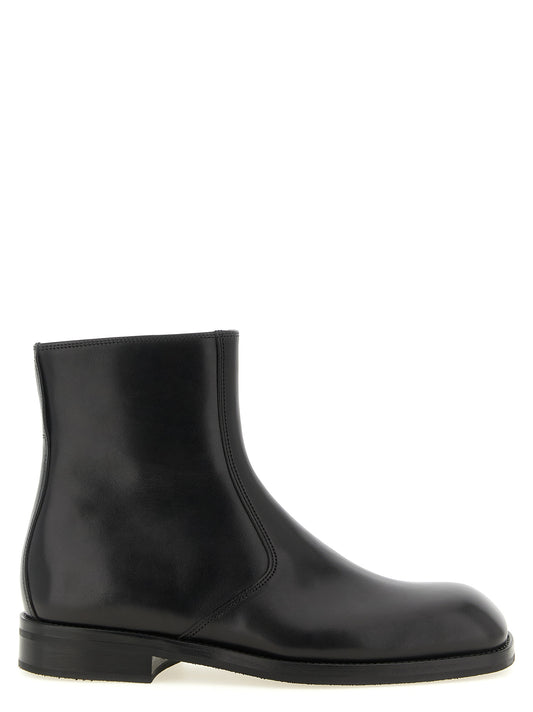 Ankle Boots by Lemaire for men in lamb leather black features an avant-garde Men's Lamb Leather Ankle Boots silhouette, defined by a sophisticated and a avant-garde square toe style.
