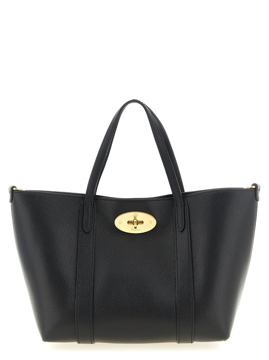 Mni Tote Bag by Mulberry for women in calfskin leather black, gold & signature features an metropolitan chic Icon Calfskin Leather Mni Tote Bag design with a secure , metropolitan chic , and versatile shoulder-strap, handle & adjustable-strap for a metropolitan chic look.