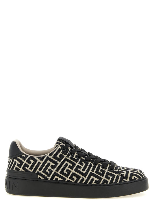 Sneakers by Balmain for men in polyester cotton leather bicolour, beige, black, white, jacquard & monogram features a chic design, perfectly showcasing the chic low-top style of this Men's Low Top Polyester Cotton Leather Sneakers.