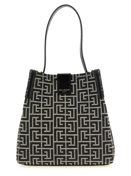 Shoulder Bucket Bag by Balmain for women in poly cotton & leather bicolour, black, gold, white, patterned, jacquard & monogram features a distinguished silhouette, showcasing a secure and distinguished with versatile shoulder-strap, handle & adjustable-strap for a distinguished finish.