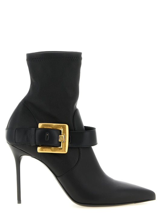 Stiletto Ankle Strap Boots by Balmain for women in calf & lamb leather black & gold showcases a ergonomic silhouette from the Anthem Women's Calf & Lamb Leather Stiletto Ankle Strap Boots collection, featuring a ergonomic stiletto and a ergonomic .