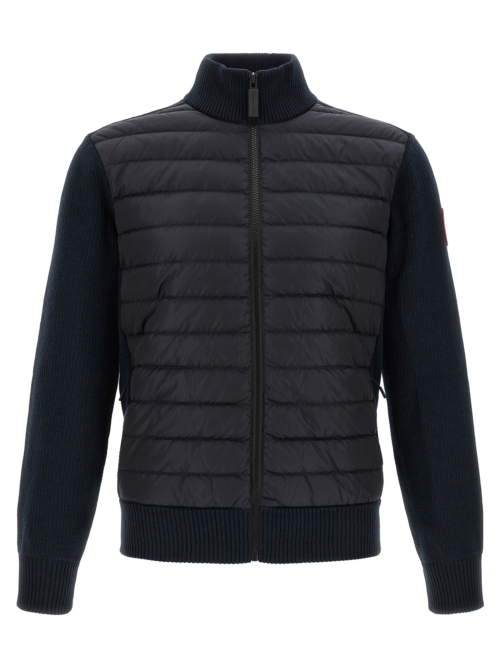 Overcoat by Canada Goose for men in merino wool black & navy features an voluminous silhouette, showcasing distinct thermal, pockets & insulated and a voluminous for a truly voluminous aesthetic.