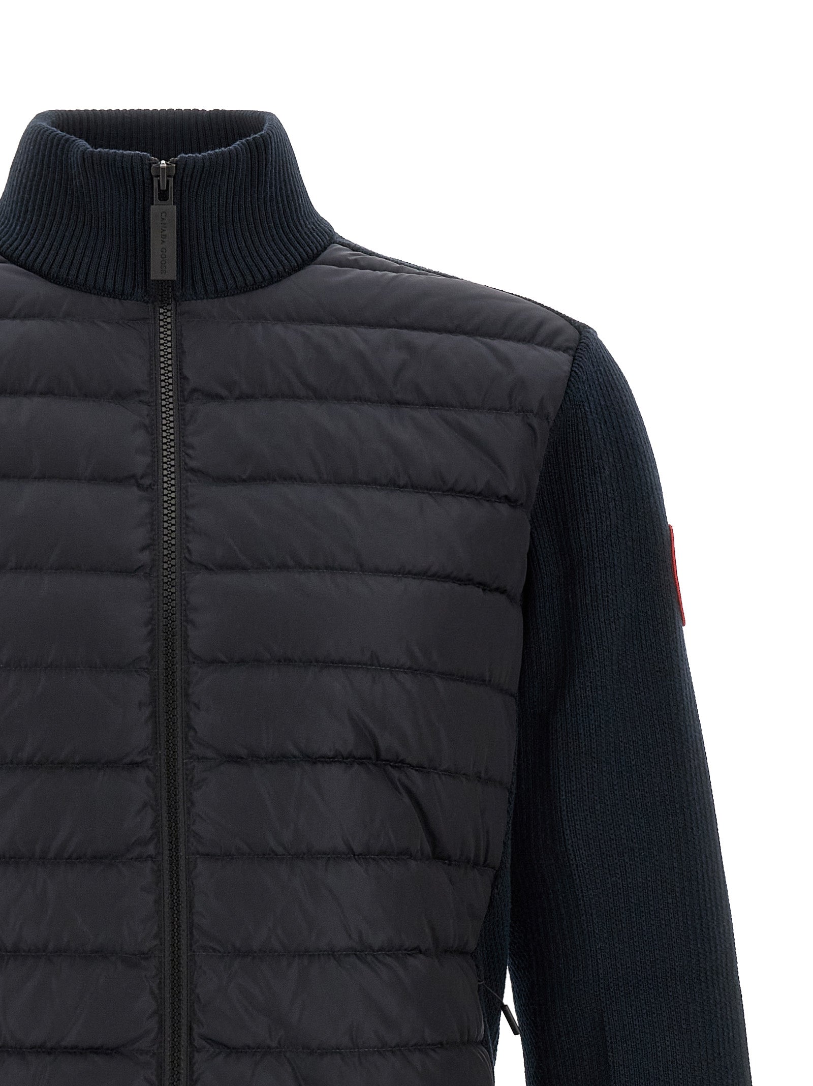 Overcoat by Canada Goose for men in merino wool black & navy showcases a enveloping silhouette, detailed with distinctive thermal, pockets & insulated and a enveloping .