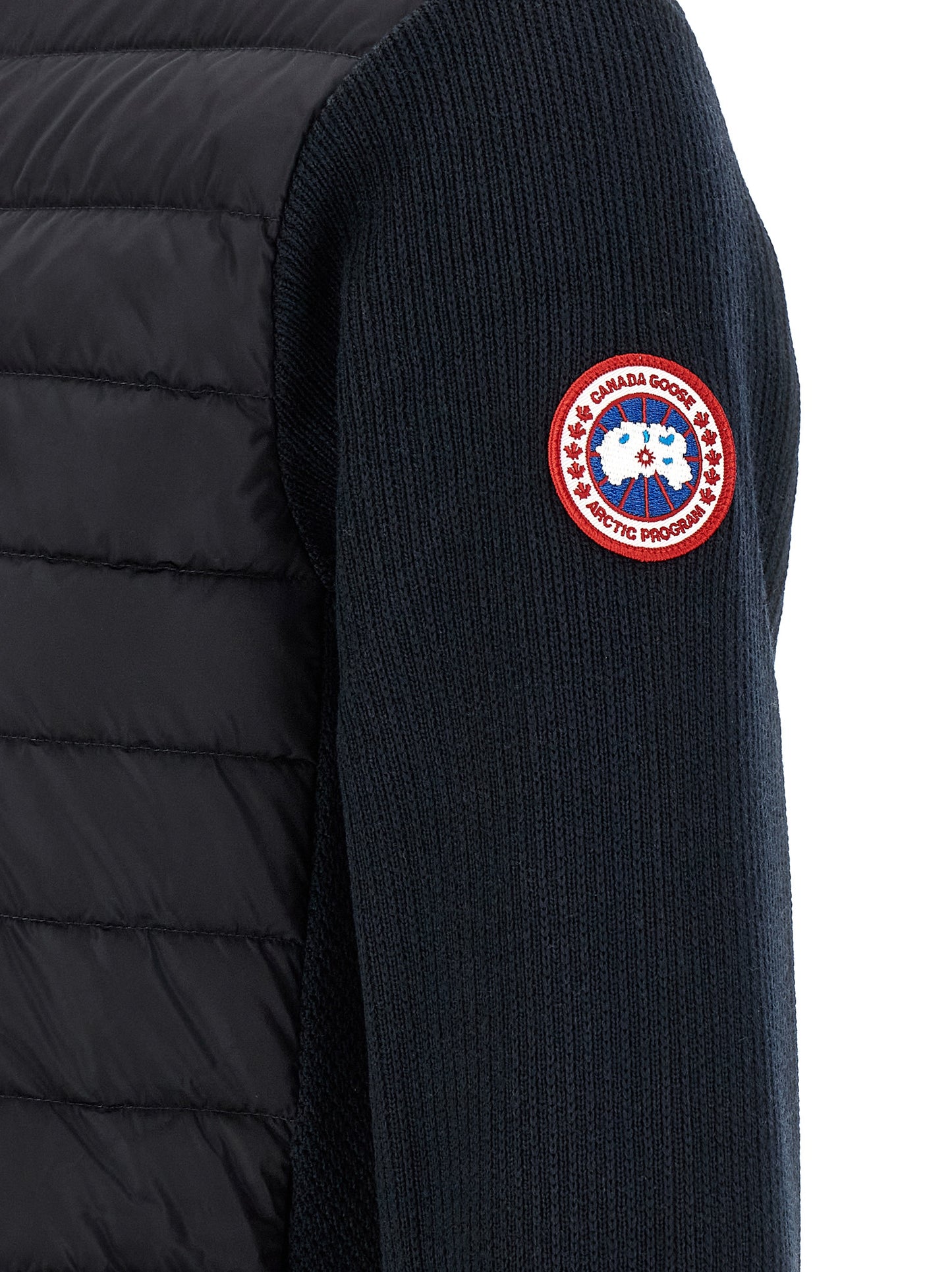 Overcoat by Canada Goose for men in merino wool black & navy features an voluminous silhouette, showcasing distinct thermal, pockets & insulated and a voluminous for a truly voluminous aesthetic.