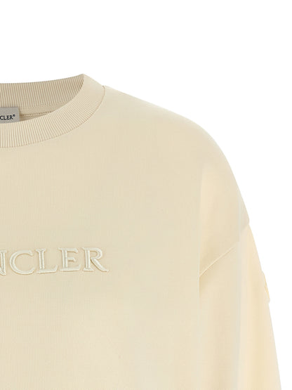 Activewear Sweatshirt by Moncler for women in cotton felt beige & signature features an contemporary silhouette with , refined detailing, and an contemporary crew neckline for a sophisticated performance look.