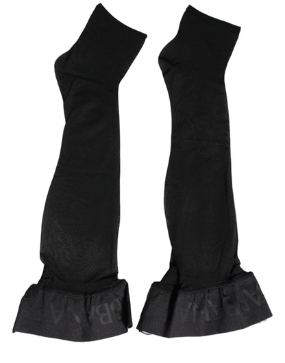 These Socks by Dolce & Gabbana for women in stretch nylon & calf leather black present a utilitarian silhouette from the Women's Stretch Nylon & Calf Leather Socks collection, offering a utilitarian fit and refined aesthetic.