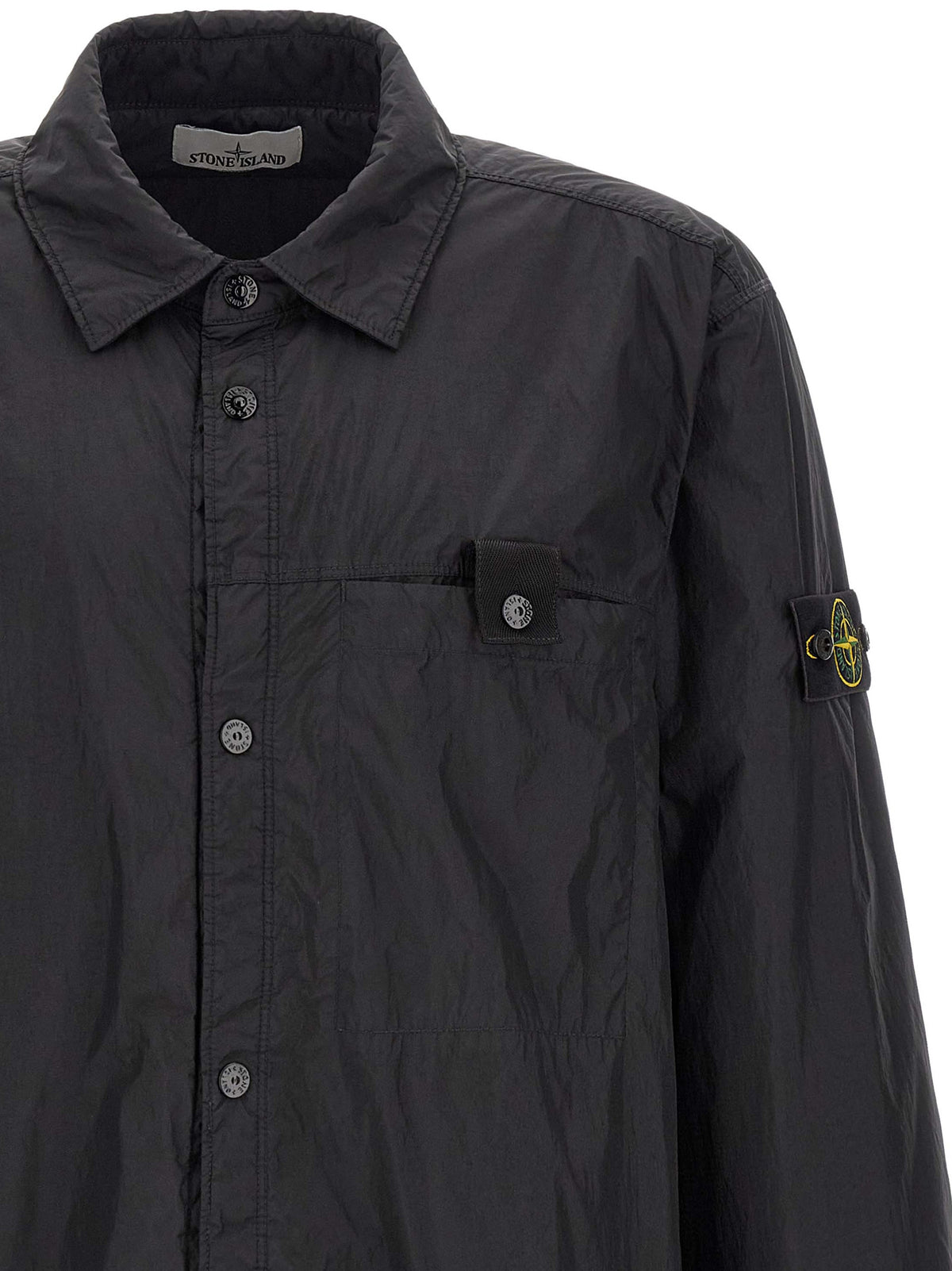 Windbreaker Jacket by Stone Island for men in nylon & resin black & signature showcases a urban chic silhouette, detailed with a urban chic shirt-collar neckline and functional lightweight & windproof for a polished finish.