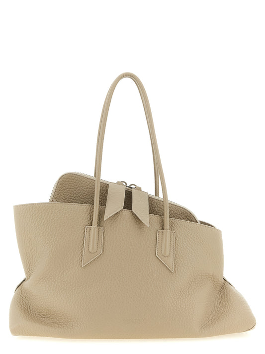 Medium Shoulder Bag by The Attico for women in bos taurus suede calf leather beige & sand presents a versatile silhouette, showcasing a secure zipper and versatile with versatile shoulder-strap & handle for a sophisticated look.