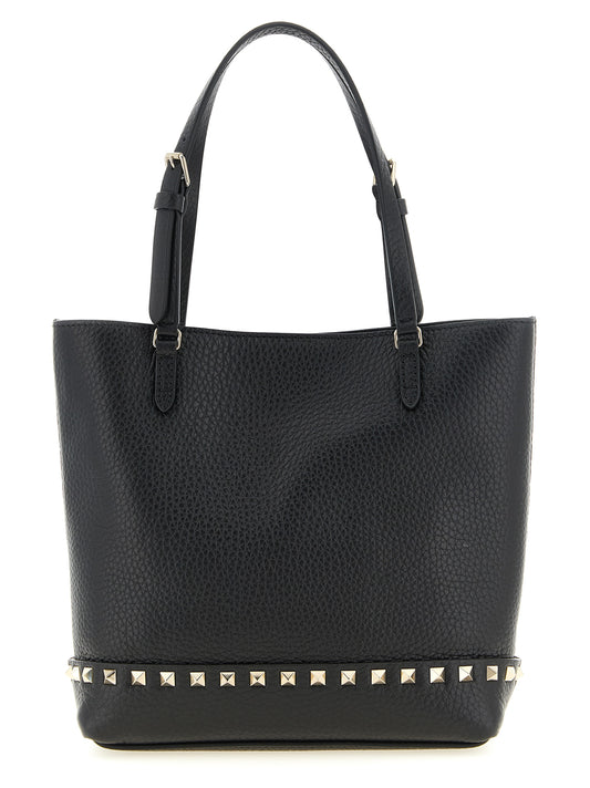 Small Shoulder Tote Bag by Valentino Garavani for women in calfskin leather black presents a versatile silhouette, showcasing a secure zipper and versatile with versatile shoulder-strap, handle, adjustable-strap & detachable-strap for a sophisticated look.