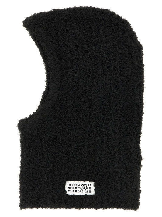 Balaclava by MM6 Maison Margiela for women in marabou wool black & signature features a riviera-ready silhouette, artfully capturing the essence of the riviera-ready Marabou Wool Balaclava design for a sophisticated look.