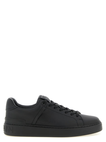 Sneakers by Balmain for men in bos taurus calfskin leather black, signature & monogram features a chic design, perfectly showcasing the chic low-top style of this Men's Low Top Bos Taurus Calfskin Leather Sneakers.