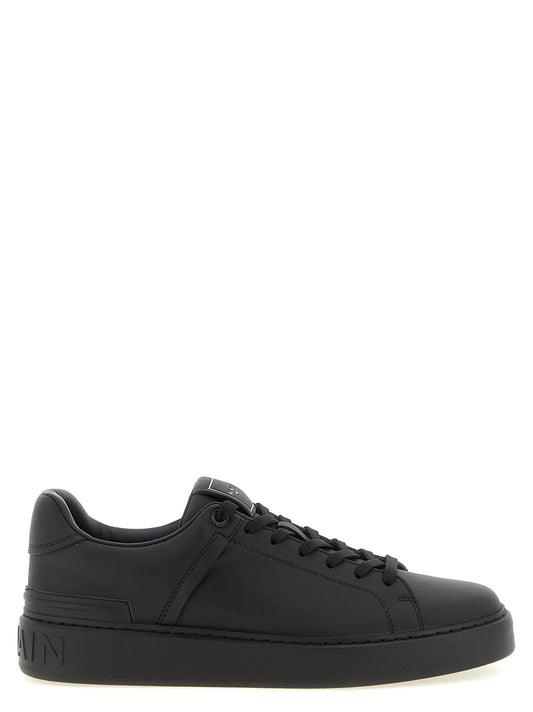 Sneakers by Balmain for men in bos taurus calfskin leather black, signature & monogram features a chic design, perfectly showcasing the chic low-top style of this Men's Low Top Bos Taurus Calfskin Leather Sneakers.