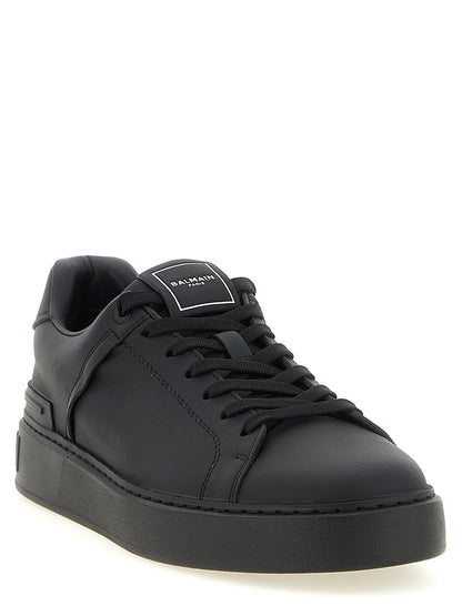 Sneakers by Balmain for men in bos taurus calfskin leather black, signature & monogram features an versatile design from the Men's Low Top Bos Taurus Calfskin Leather Sneakers collection, highlighting a versatile low-top style for a premium, high-fashion look.