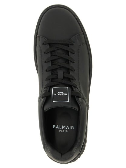 Sneakers by Balmain for men in bos taurus calfskin leather black, signature & monogram features an versatile design from the Men's Low Top Bos Taurus Calfskin Leather Sneakers collection, highlighting a versatile low-top style for a premium, high-fashion look.