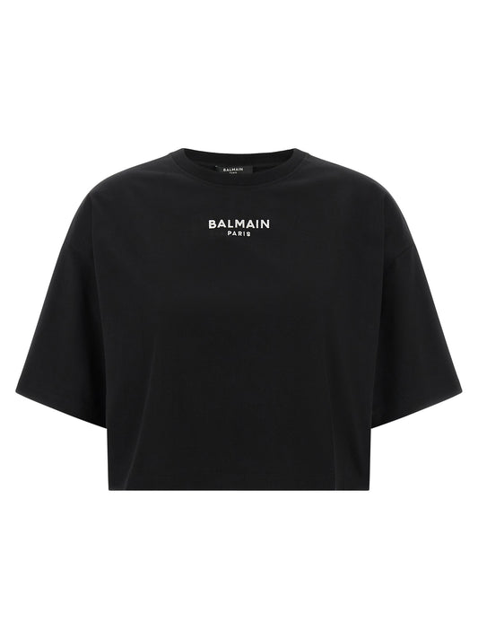 T-Shirt by Balmain for women in cotton black showcases a dramatic silhouette, elegantly detailed with a dramatic and short-sleeve for a truly dramatic finish.