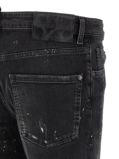 Jeans by Dsquared² for men in stretch denim cotton black & red features an refined tailoring silhouette, showcasing a premium slim with a and long cut for a refined tailoring look.