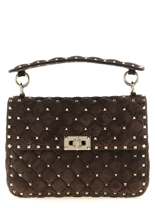2-in-1 Shoulder & Crossbody Handbag by Valentino Garavani for women in suede calfskin leather brown features an versatile silhouette, showcasing a secure zipper and versatile with versatile crossbody-strap, shoulder-strap & handle for a versatile finish.