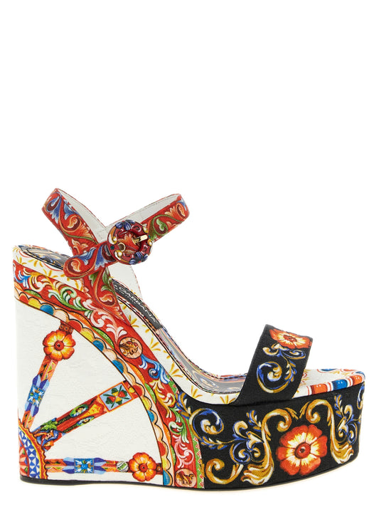 Wedge Ankle Strap Sandals by Dolce & Gabbana for women in cotton viscose & leather multicolor & print presents a sculptural silhouette, showcasing the Maiolica Women's Cotton Viscose & Leather Wedge Ankle Strap Sandals design with a sculptural wedge and for a premium look.