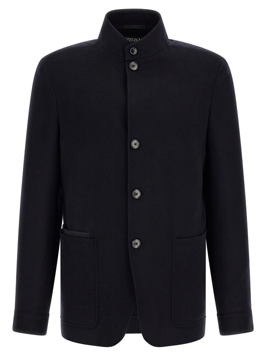 Overcoat by ZEGNA for men in cashmere & leather blue features an voluminous silhouette, showcasing distinct pockets and a voluminous high-collar neckline for a truly voluminous aesthetic.