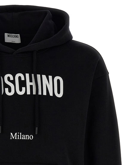 Sweatshirt Hoodie by Moschino for men in cotton black & print features an avant-garde silhouette, showcasing a sophisticated hooded neckline and detail for a truly avant-garde finish.