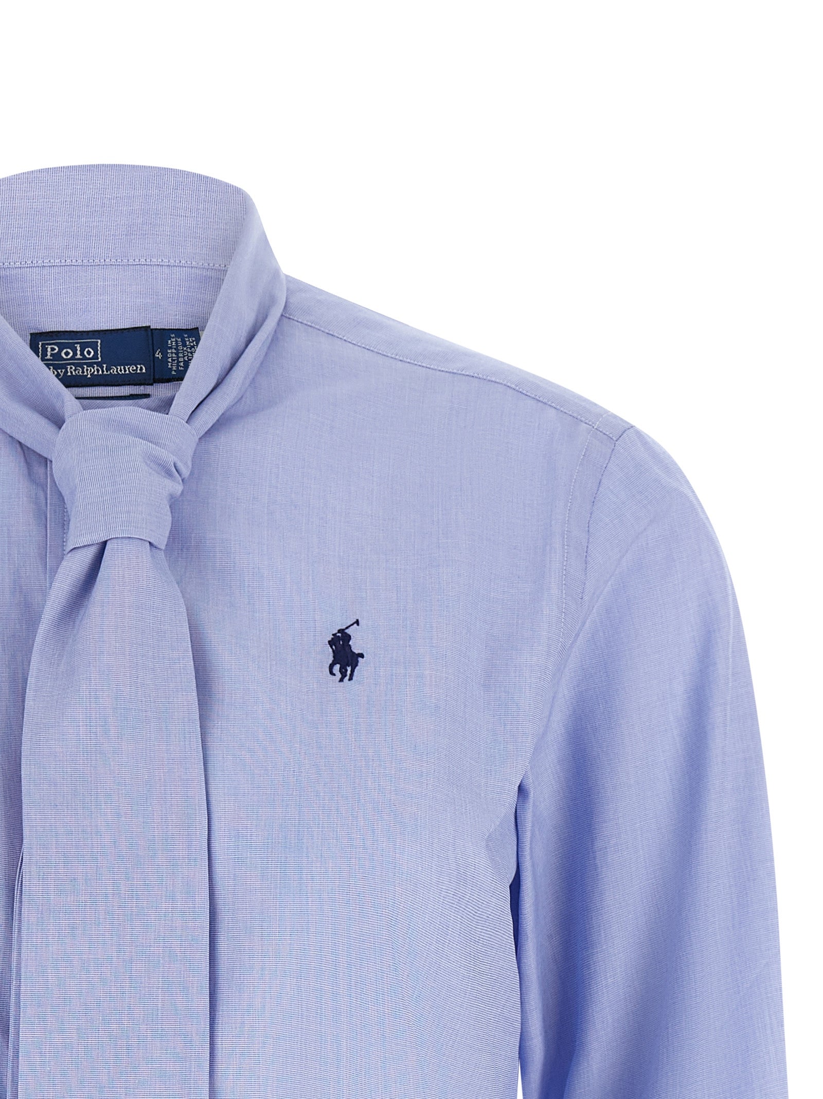 Blouse by Polo Ralph Lauren for women in cotton light-blue showcases a sublime silhouette, artfully detailed with a sublime and for a sophisticated, sublime finish.