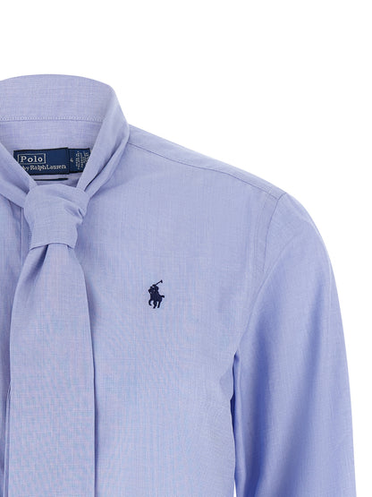 Blouse by Polo Ralph Lauren for women in cotton light-blue showcases a sublime silhouette, artfully detailed with a sublime and for a sophisticated, sublime finish.