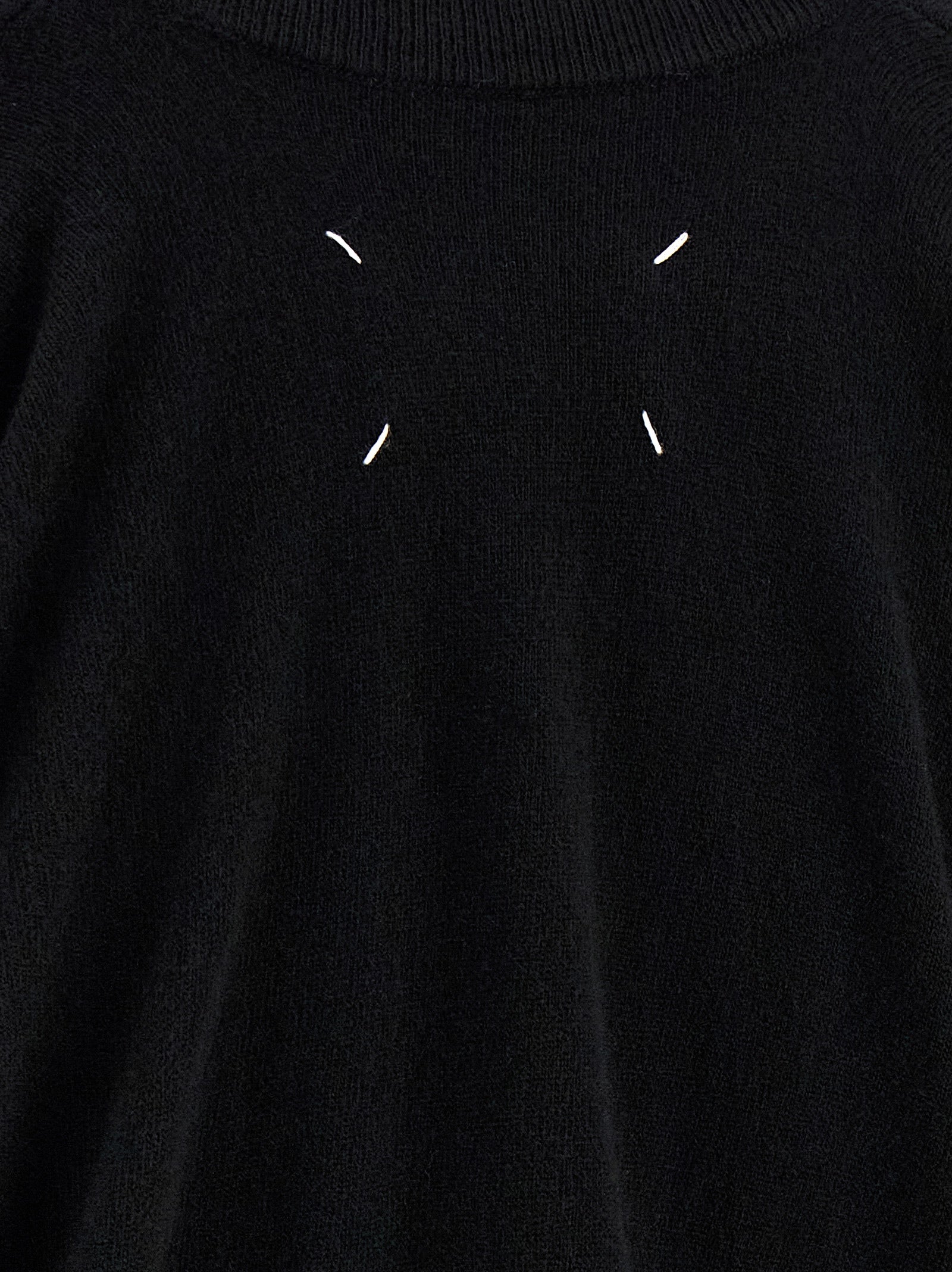 Cardigan by Maison Margiela for women in virgin wool black & signature features a dramatic silhouette, showcasing a sophisticated and dramatic detail for a timeless, premium look.