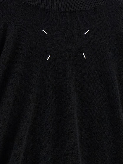 Cardigan by Maison Margiela for women in virgin wool black & signature features a dramatic silhouette, showcasing a sophisticated and dramatic detail for a timeless, premium look.