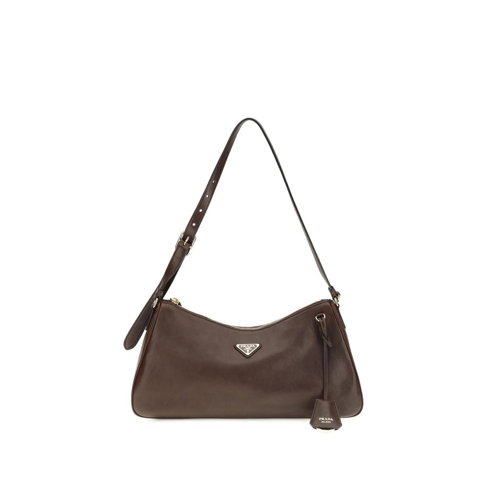 Shoulder Bag by Prada for women in bos taurus nappa leather brown & natural features a effortless sophistication silhouette, secured by a zipper with ample and versatile shoulder-strap for a effortless sophistication finish.