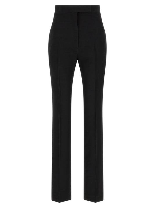 Trousers by Tom Ford for women in satin wool black presents a perennial silhouette, meticulously tailored with a straight & slim cut, long finish, and an elegant high rise.