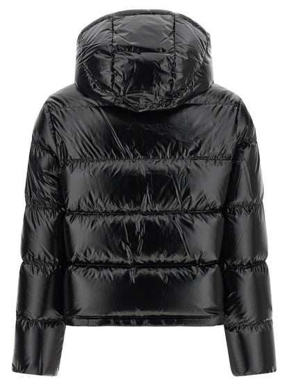 Hooded Puffer Jacket by Moncler for women in polyamide & felt black & gold showcases a bohemian silhouette, artfully detailed with a bohemian hooded high-neck neckline and signature hooded & insulated for a truly bohemian finish.