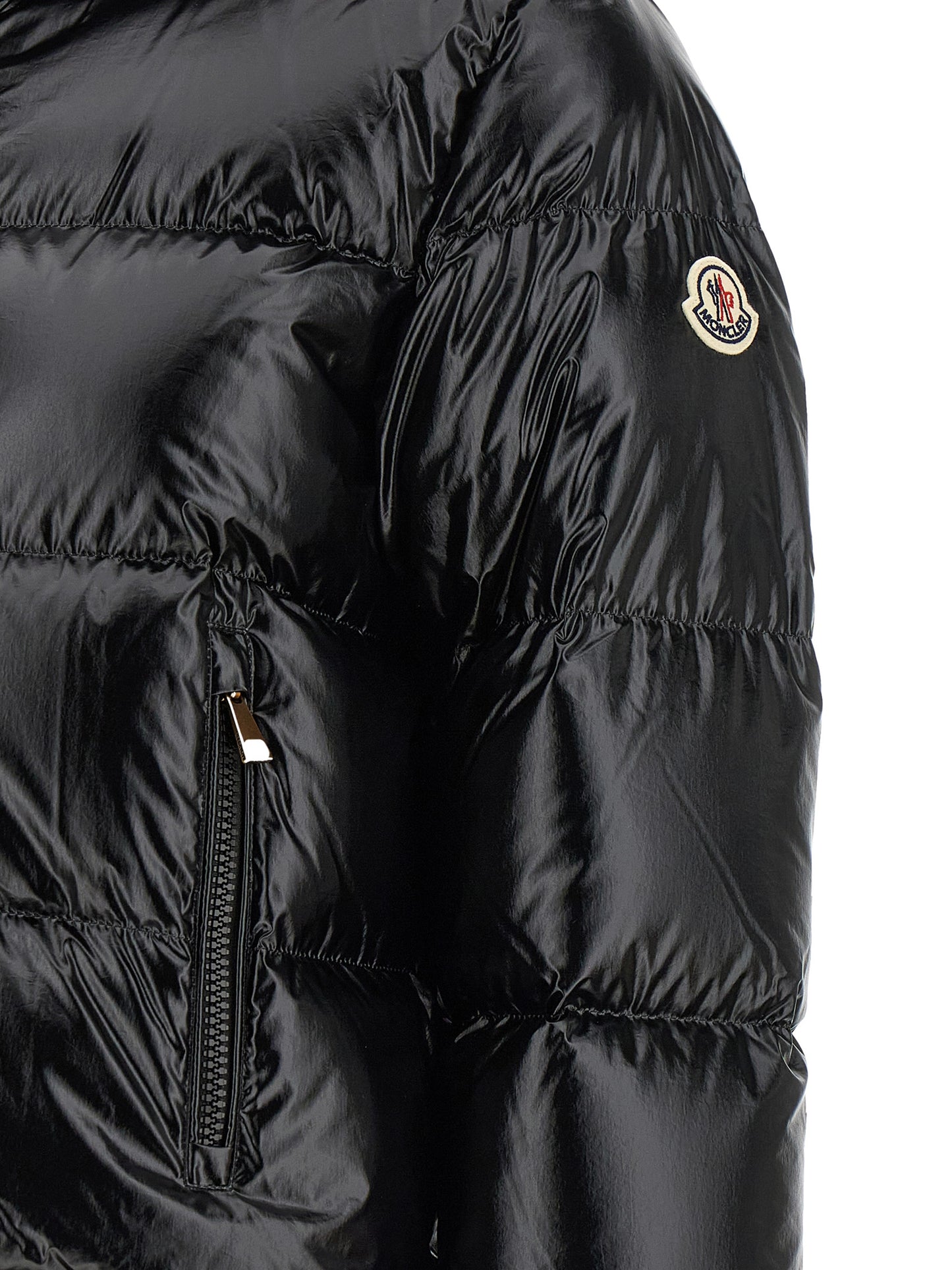Hooded Puffer Jacket by Moncler for women in polyamide & felt black & gold presents a effortlessly chic silhouette, showcasing a sophisticated and premium hooded & insulated for a truly effortlessly chic finish.